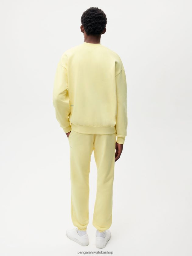 odjeća Pangaia u pretvorbenim pamučnim trenirkama sunčeva zraka žuta žene 4VDHN0357