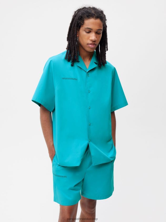 odjeća Pangaia košulja kratkih rukava od organskog pamuka paunovo plavetnilo žene 4VDHN0393